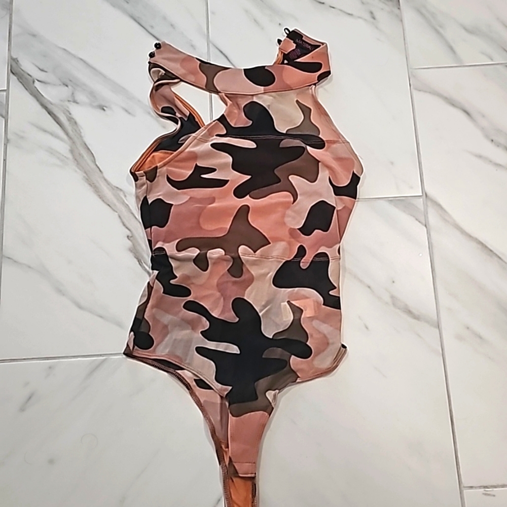 Ladies pink fatigue bodysuit size small